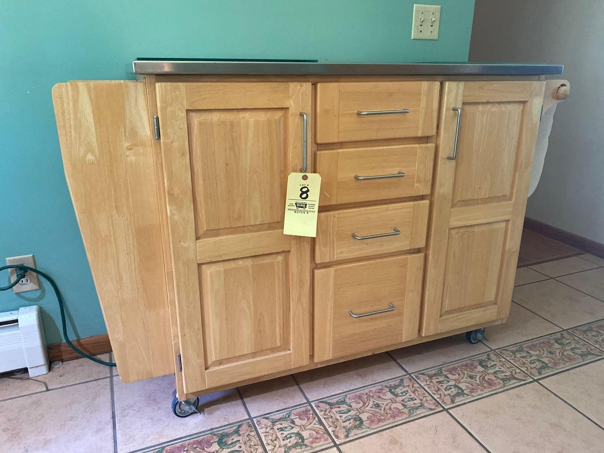 Portable kitchen cabinet w/ stainless-steel top on wheels.