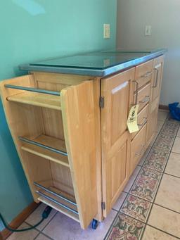 Portable kitchen cabinet w/ stainless-steel top on wheels.