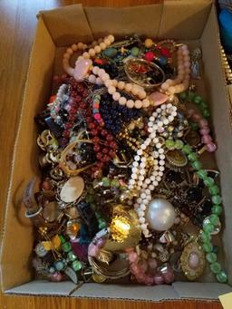 2 boxes of costume jewelry