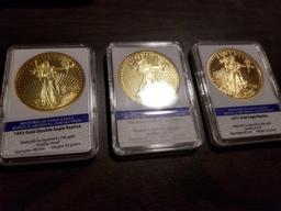 1933, 1933, and 2011 Gold Eagle replica coins, bid x 3