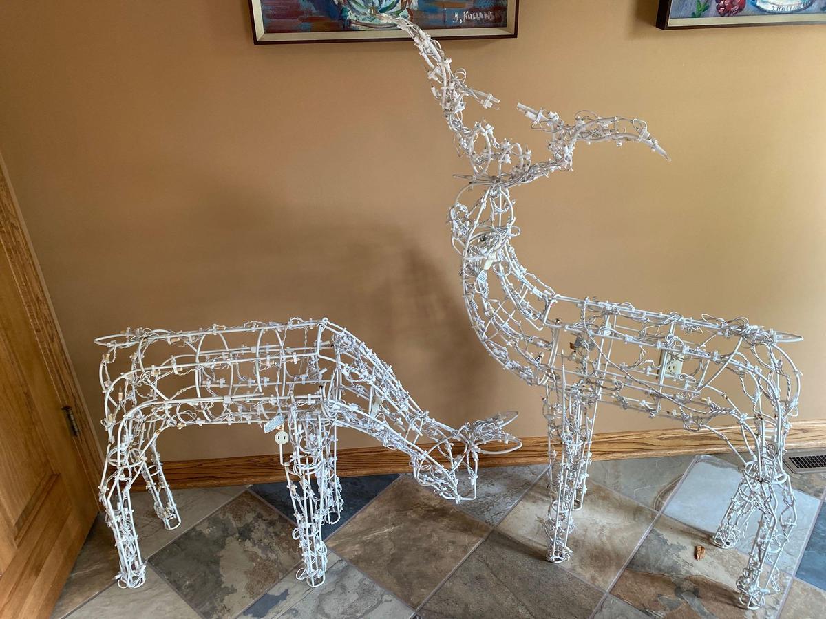 (2) Lighted deer yard ornaments.