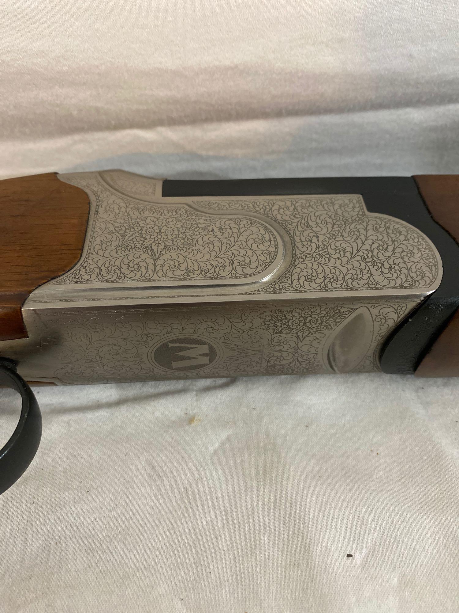 Mossberg Silver Reserve II Over/Under 28ga. Engraved metal. NEW W/ BOX.