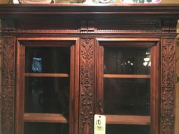 Two pc heavily carved china hutch