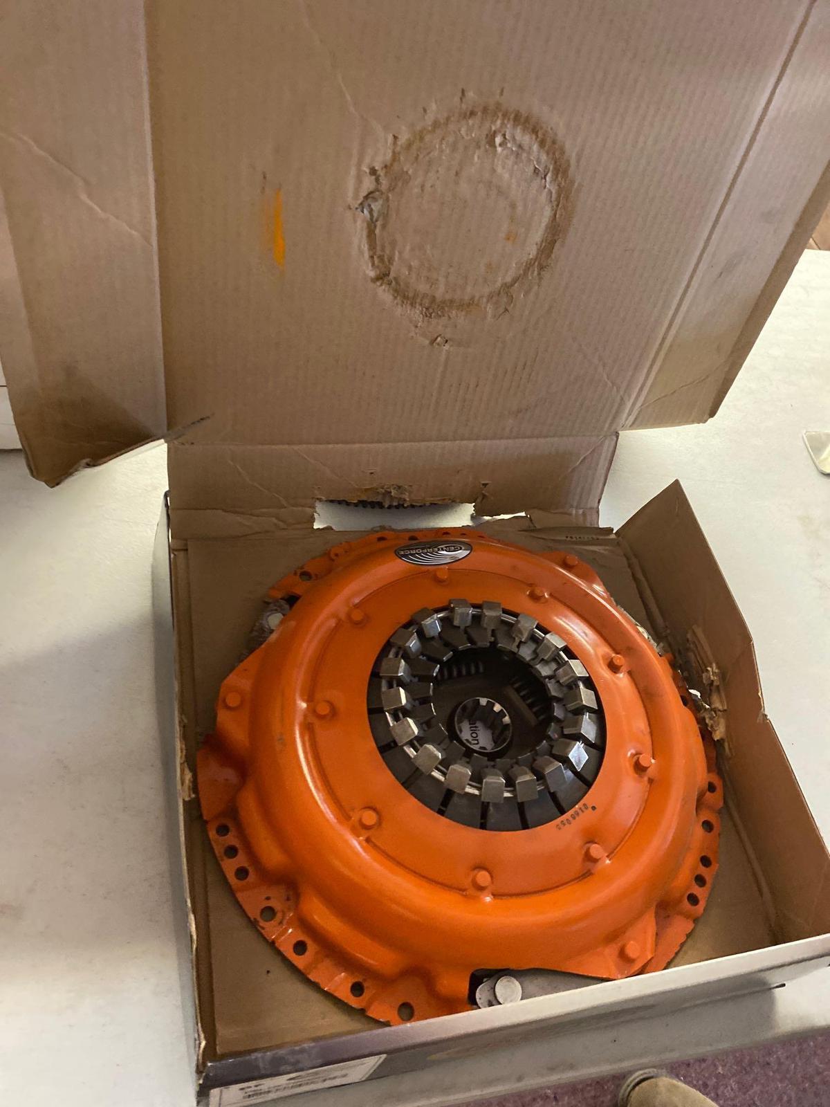 Center force clutch and flywheel