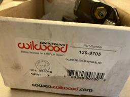 Wilwood red calipers and 1 black caliper