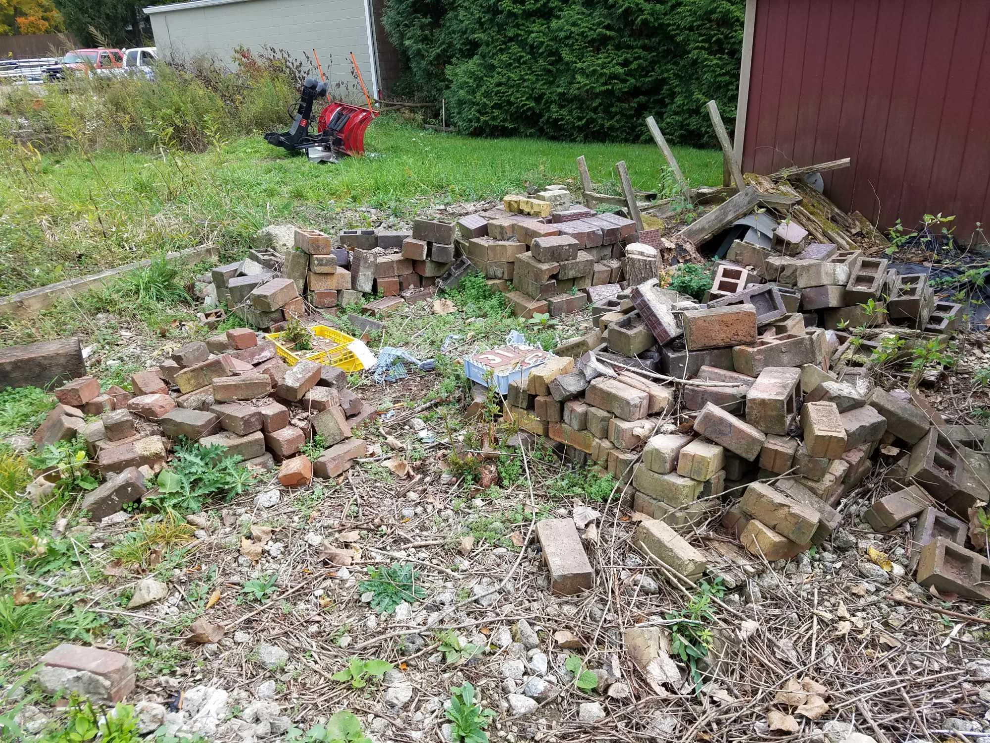 Group of assorted paving brick. Some from Ohio State Prison