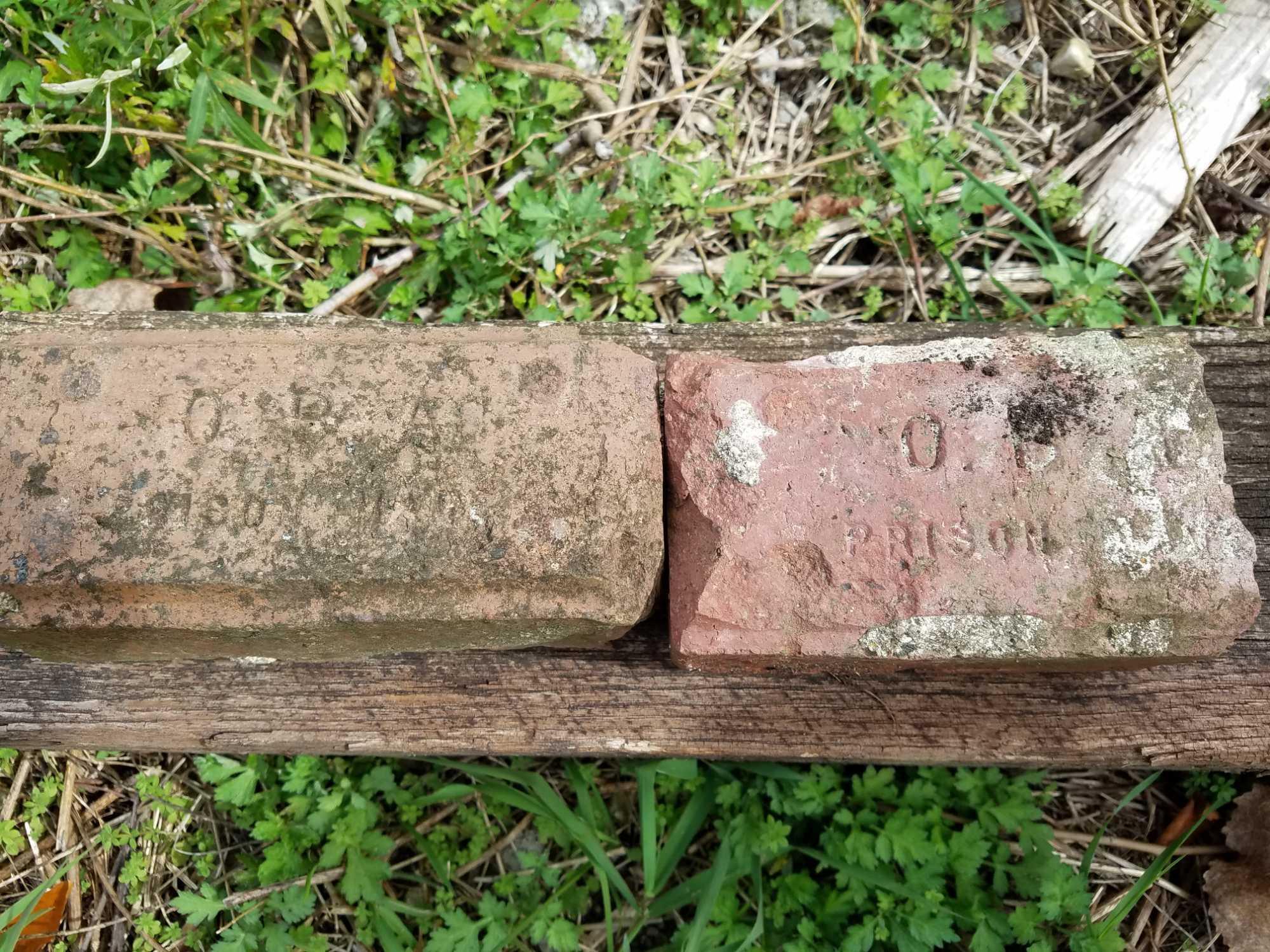 Group of assorted paving brick. Some from Ohio State Prison