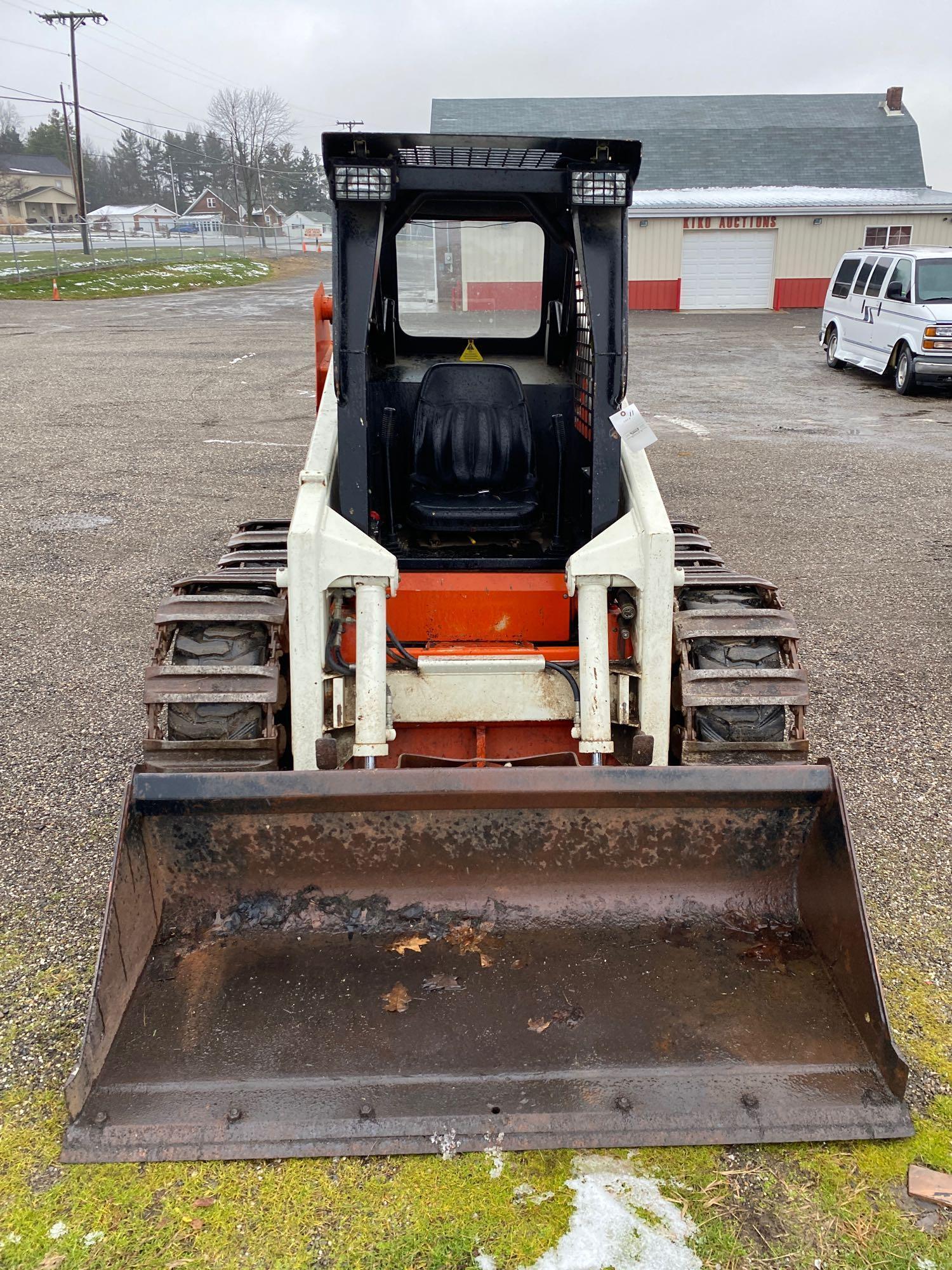 Scat Trak 1300C skid loader with tracks, 1010 hours, Perkins diesel engine, very good condition