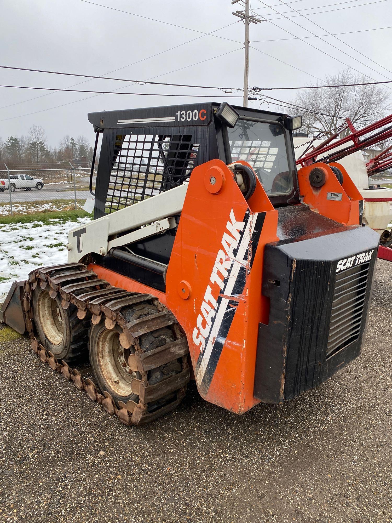 Scat Trak 1300C skid loader with tracks, 1010 hours, Perkins diesel engine, very good condition