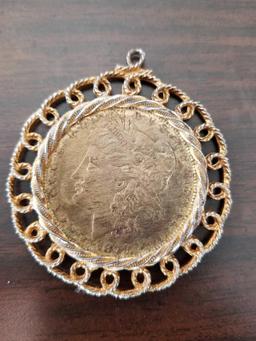 1879 Morgan silver dollar in necklace case