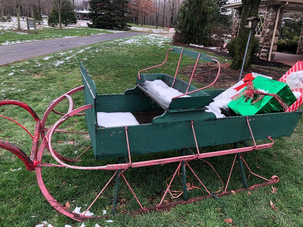 Horse drawn wagon sleigh with gift boxes