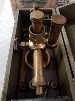 Early brass valve with wooden box