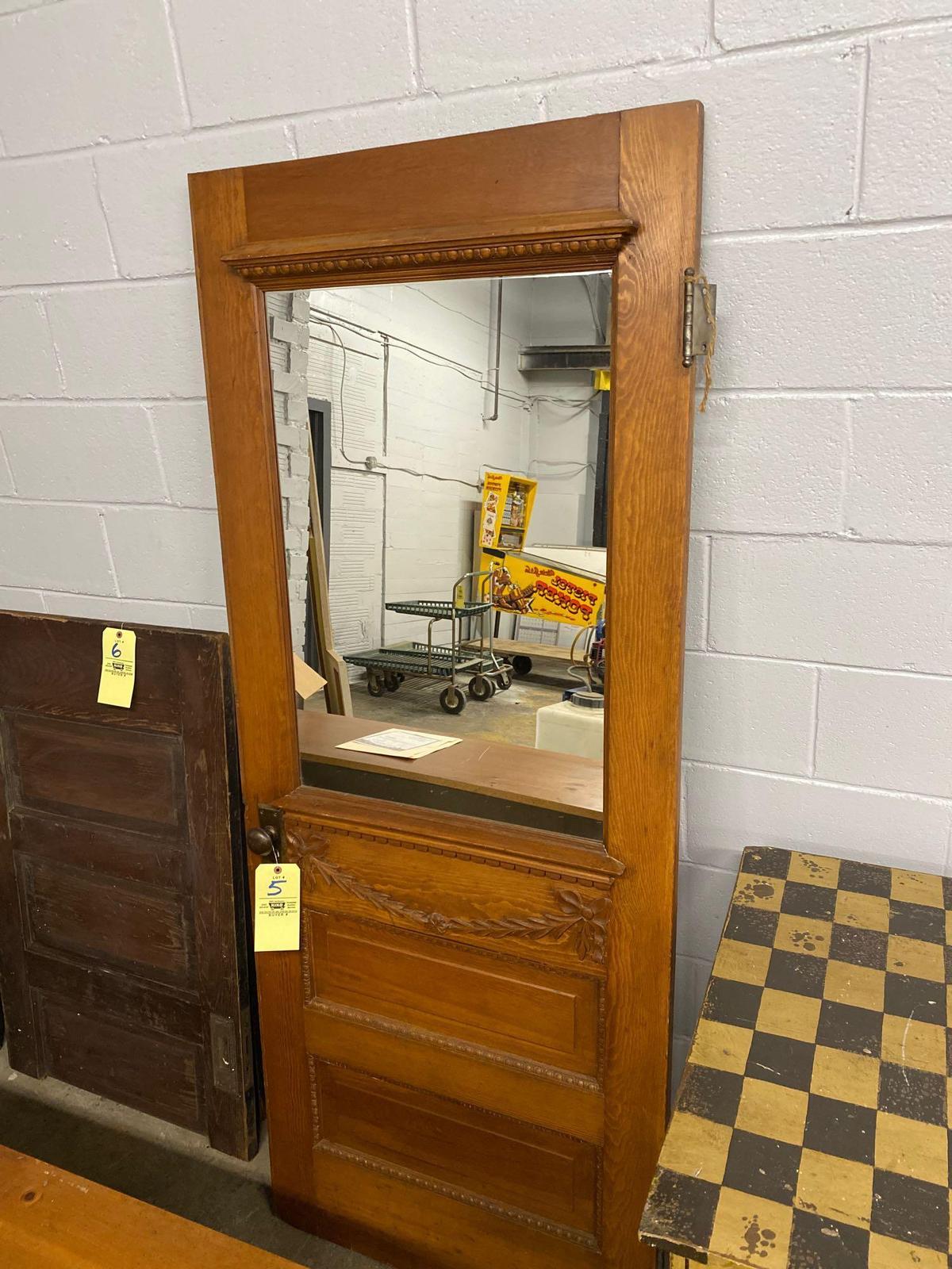 Ornate oak door with Applied carving and mirror