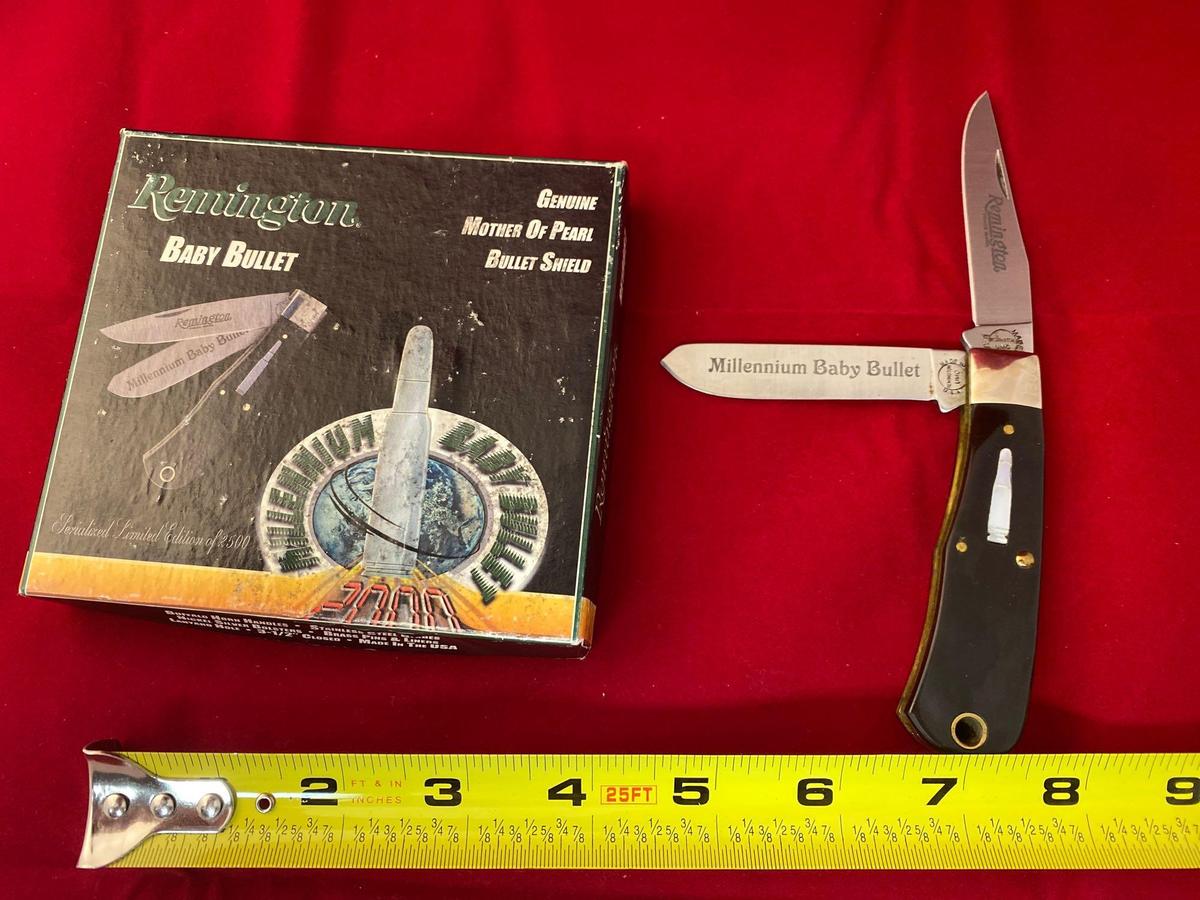 2000 Remington Millennium Baby Bullet #R1173 pocket knife, box has some moisture damage.