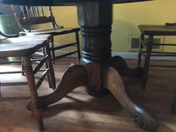 Oak ped table with 4 press back chairs