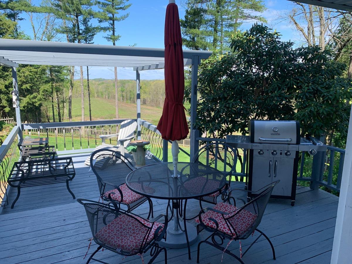 Patio table (4) chairs and umbrella