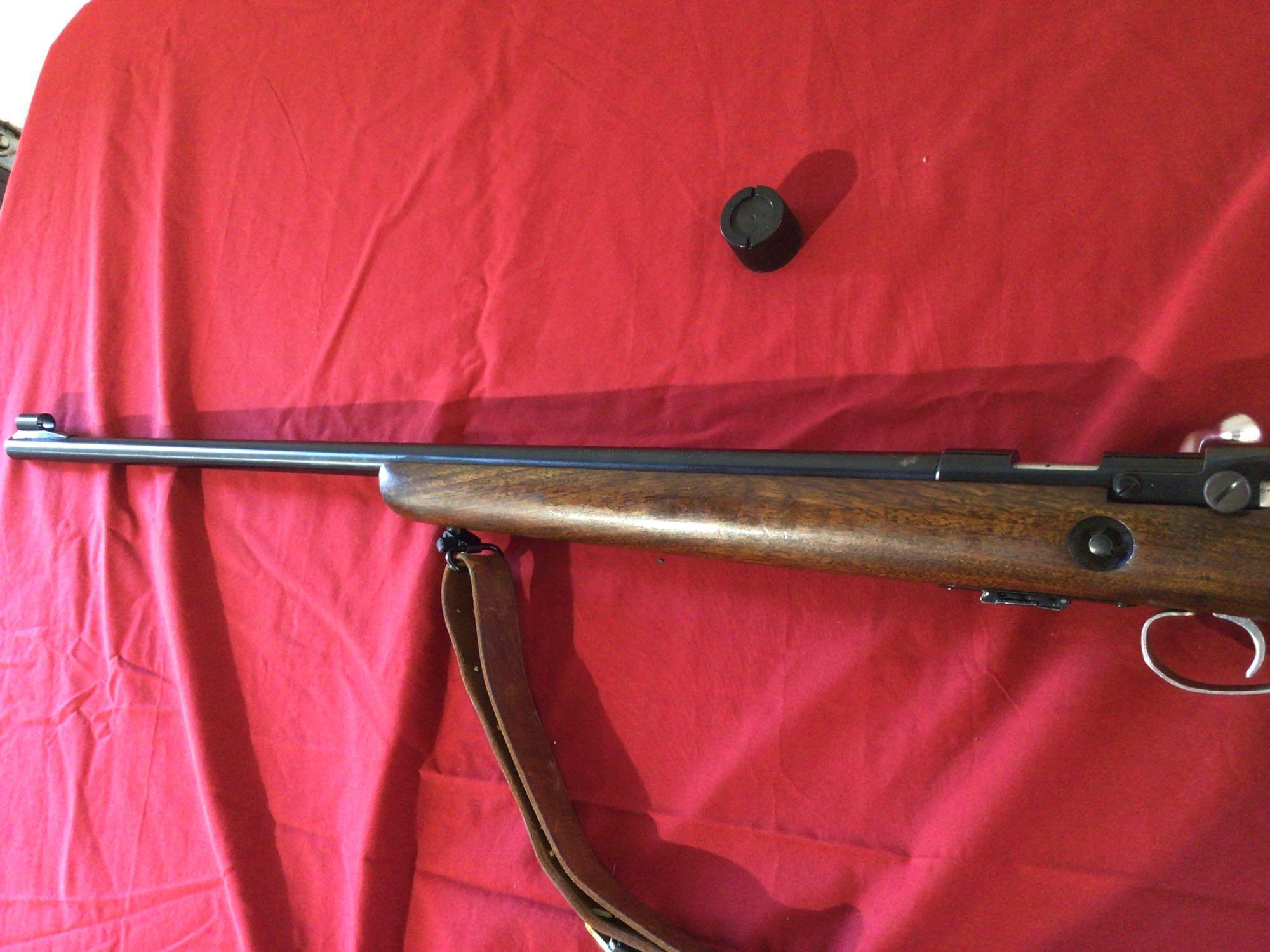 Winchester 69A. 22 cal bolt action. 25" barrel. One Winchester clip. Peep sights
