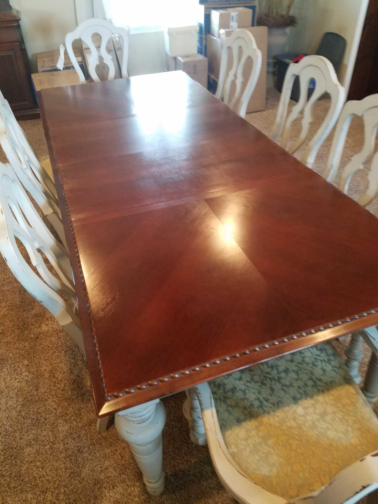 Broyhill dining room table with 8 chairs and 2 leaves