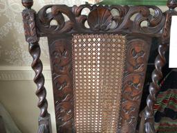 Two Carved Cane Bottom Arm Chairs
