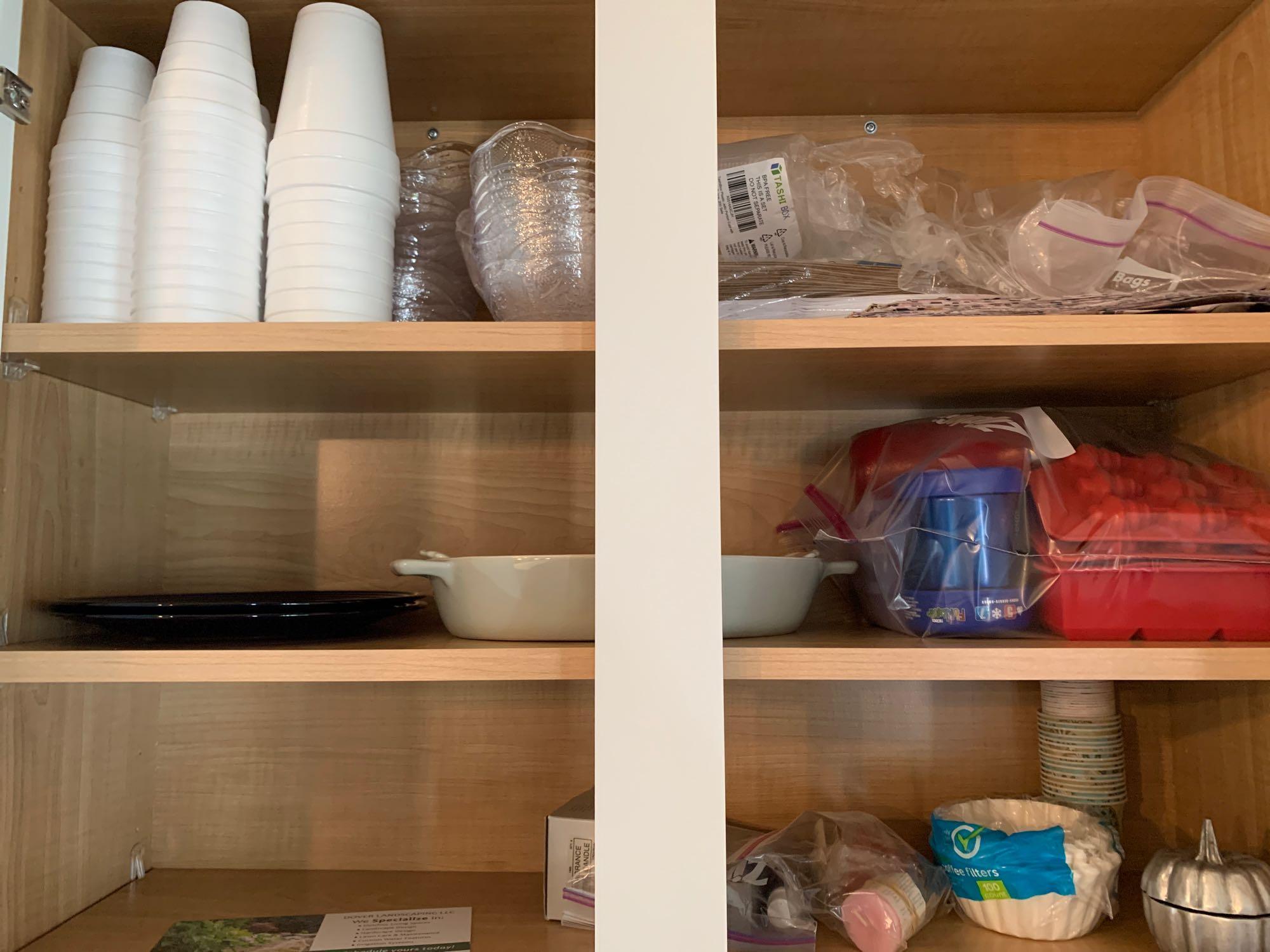 Contents of dining room server, glasses, stemware, Tupperware, baking dishes, and more