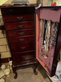 Jewelry chest w/ Queen Ann feet, 40" tall x 15" wide.