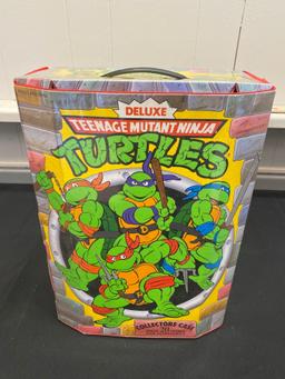 Teenage Mutant Ninja Turtles action figures in case TMNT