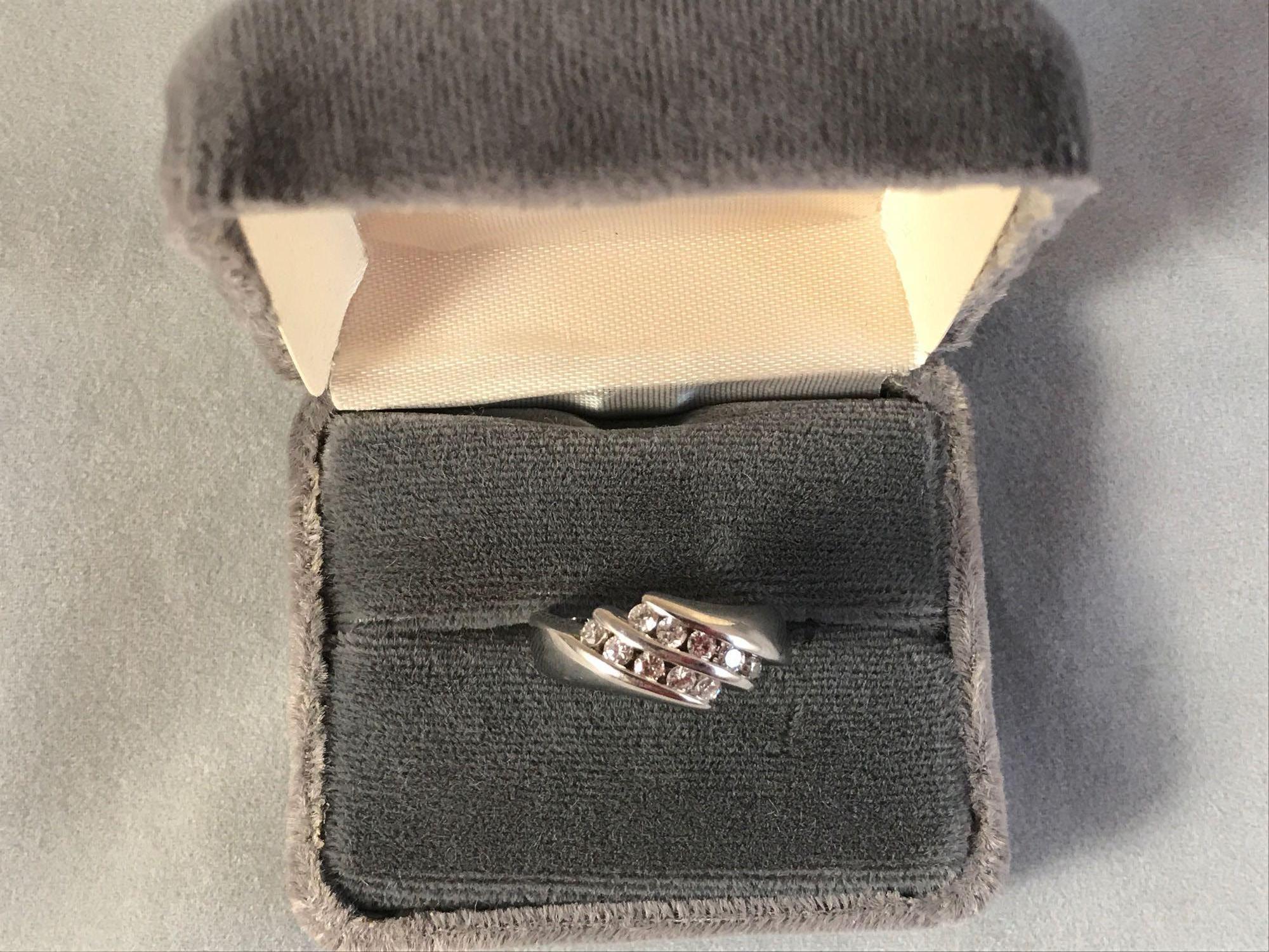 14K white gold channel set ring w/approx 3/8 ct total diamonds - 3.7 DWT