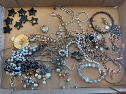 (3) Boxes of costume jewelry.