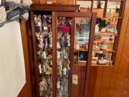 Lighted curio cabinet with sliding door