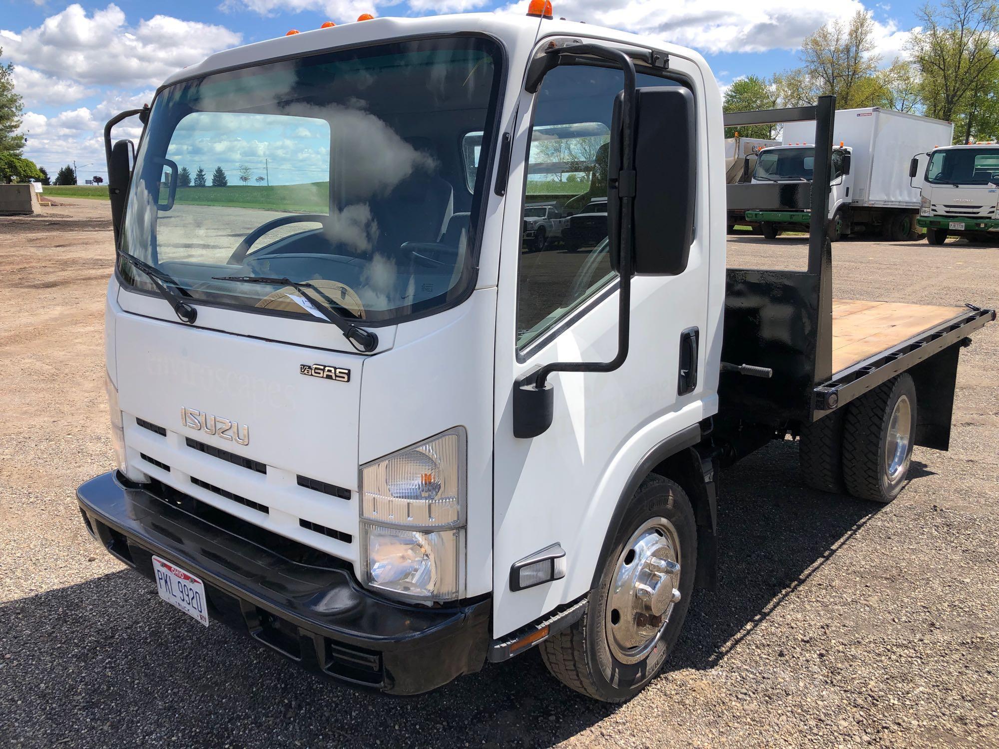 2013 Isuzu cabover flatbed truck with 50,774 miles