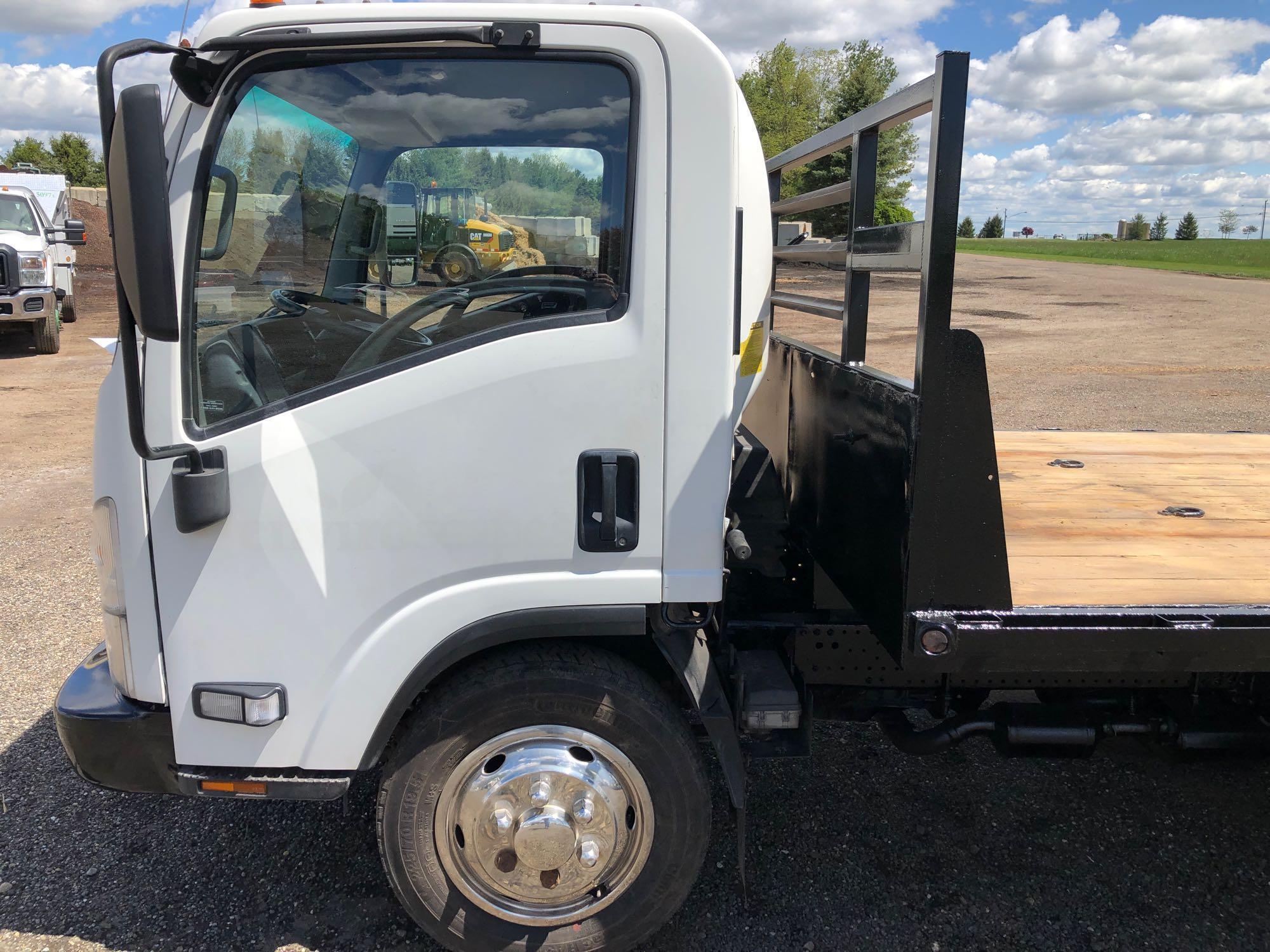 2013 Isuzu cabover flatbed truck with 50,774 miles