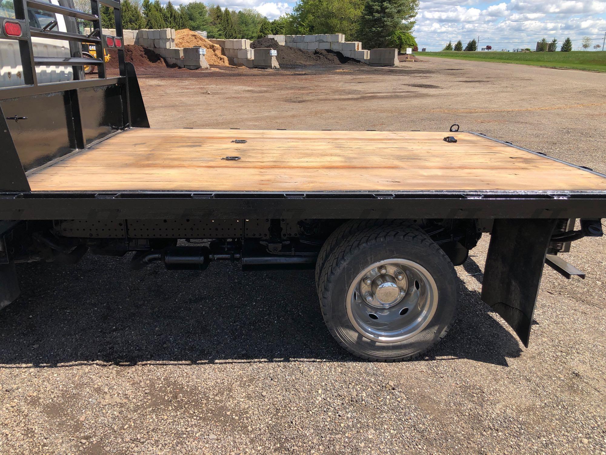 2013 Isuzu cabover flatbed truck with 50,774 miles