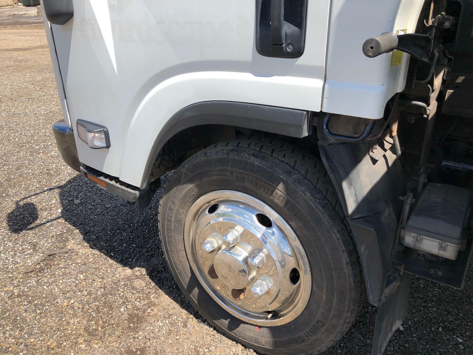 2013 Isuzu cabover flatbed truck with 50,774 miles