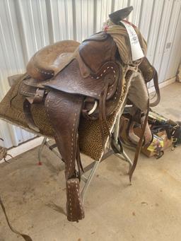 Western saddle, stand, blanket, belly strap