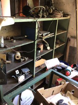 Wheel stand and contents of green shelving