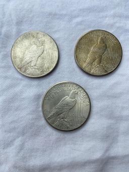 (3) Peace Silver Dollars