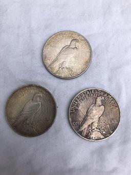 3 Peace silver dollars. All 1922