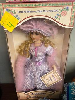 2 new dolls in boxes