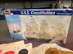 Large USS Constitution model kit, targets, wooden toy trucks