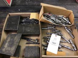 Assorted end mills and drill bits