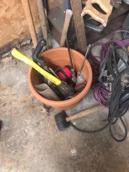 Shelf of miscellaneous tools and extension cords