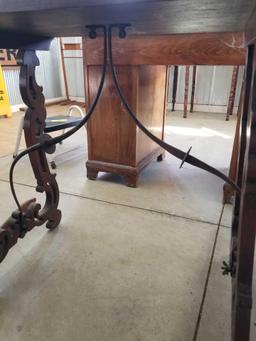 Early inlaid table, metal stretcher