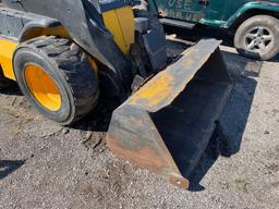 JCB skid loader w material bucket. Remotes. 185 series 3. Shows 1132hrs.