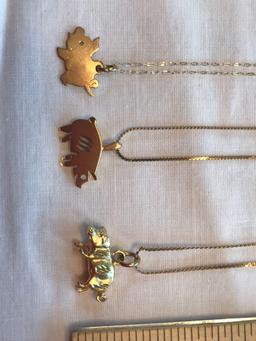 3 14K gold necklaces with 14k pig pendants