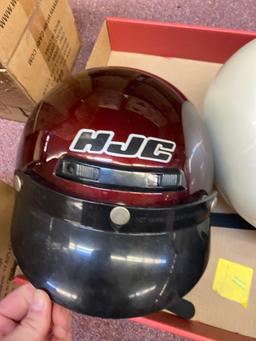 2 very nice motorcycle helmets, bell size medium, hjc size small