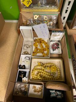 Flat of jewelry and box of pin back buttons