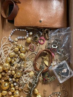 Two flats of costume jewelry and watches