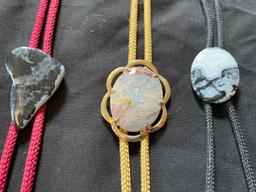 7 polished gem stone neck bolos