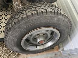 Spare lawn mower tires, trailer tire, mower deck