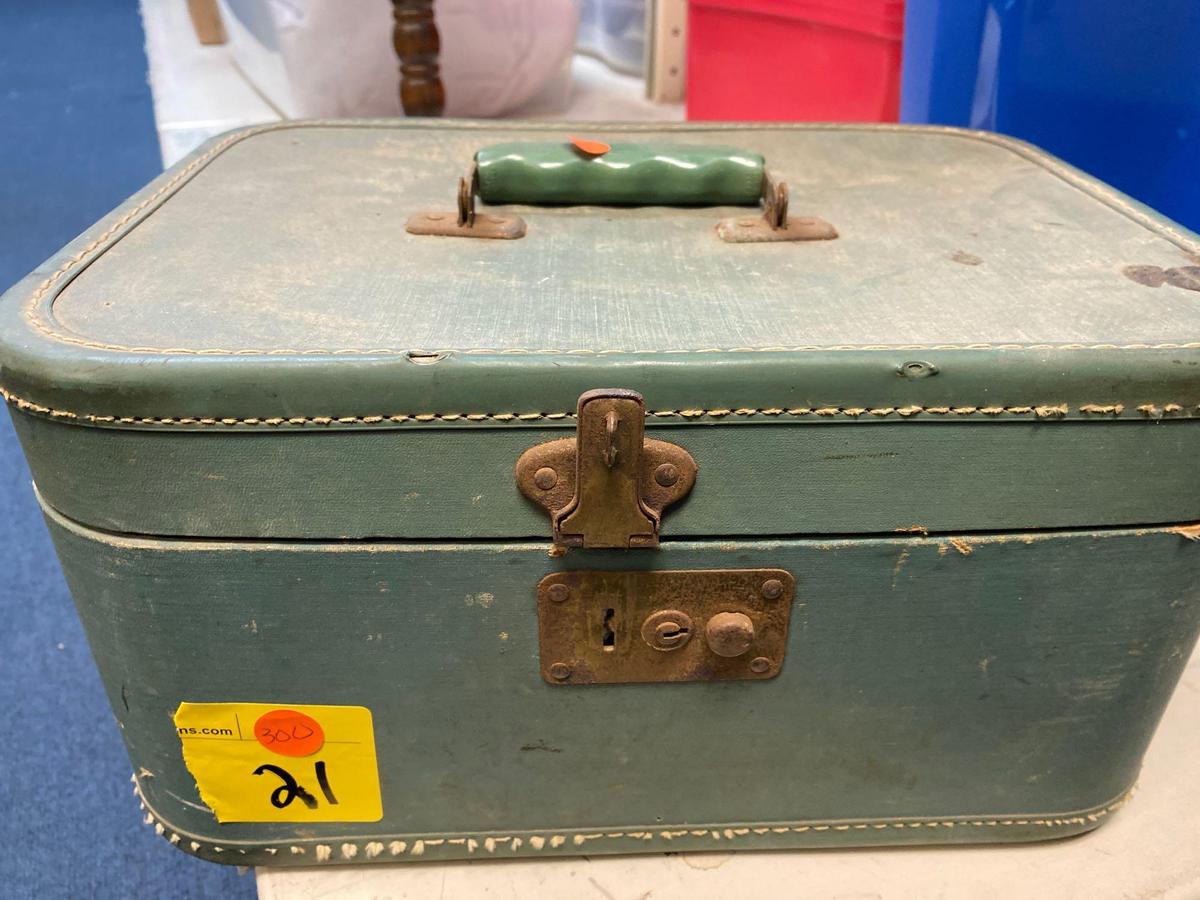 Suitcases with old photos and paper